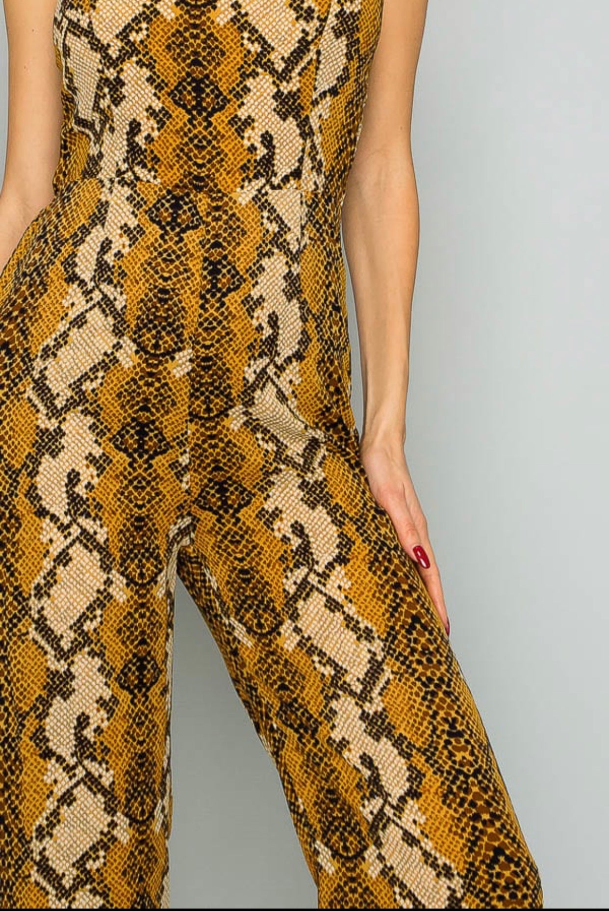SHORT SLEEVE SNAKE PRINT JUMPSUIT - BEYOU Apparel and Accessories, LLC